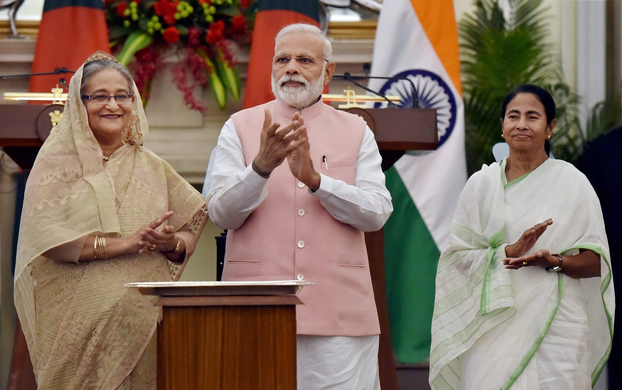 
Prime Minister Narendra Modi with his Bangladeshi counterpart Sheikh 
Hasina and West Bengal Chief Minister Mamata Banerjee (PTI)