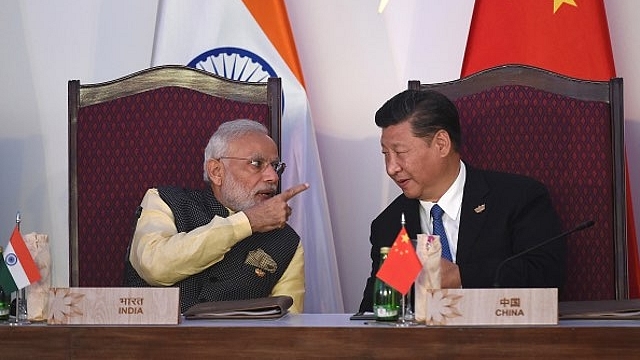 Chinese President Xi Jinping with Indian Prime Minister Narendra Modi.