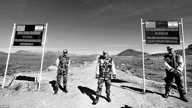 Indian army soldiers stand guard at the Indo-China border in Arunachal Pradesh