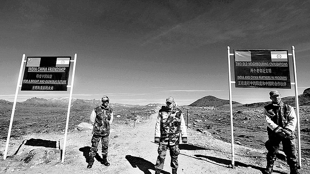 Indian army soldiers stand guard at the Indo-China border in Arunachal Pradesh