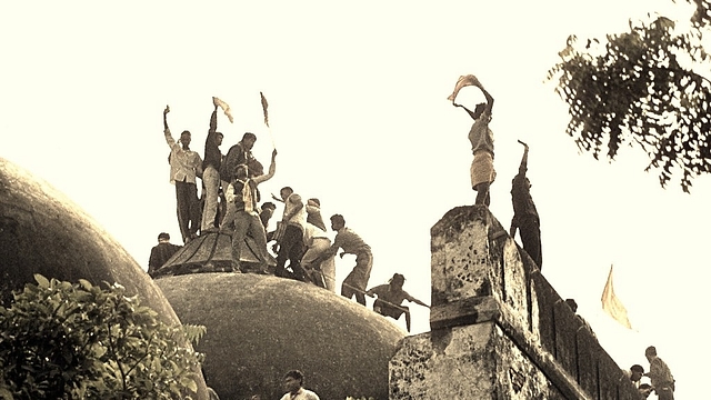 Hindu youth atop the disputed structure in Ayodhya&nbsp;