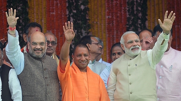 Narendra Modi, Yogi Adityanath and Amit Shah (SANJAY KANOJIA/AFP/Getty Images)