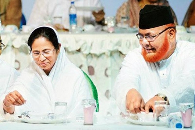 West Bengal Chief Minister Mamata Banerjee, left, with Imam Barkati. (PTI)

