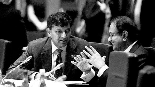 Raghuran Rajan and P Chidambaram (Jason Reed - Pool/Gertty Images)