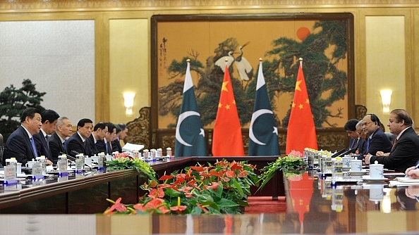 Chinese President Xi Jinping speaks with Pakistan’s Prime Minister Nawaz Sharif  at the Great Hall of the People in Beijing, China. (Parker Song-Pool/Getty Images)