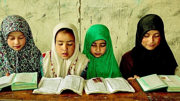 

Muslim children study the Quran at a Madrassa in a small village near the town of Kargil in Ladakh, Jammu and Kashmir, India (Photo by Creative Touch Imaging Ltd./NurPhoto via Getty Images)