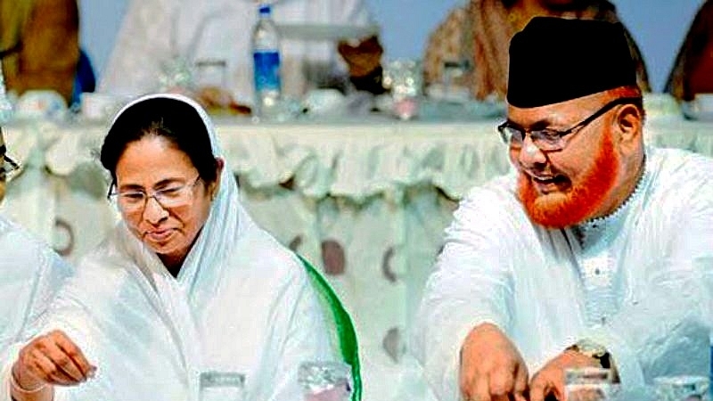 West Bengal Chief Minister Mamata Banerjee, left, with Imam Barkati. (PTI)

