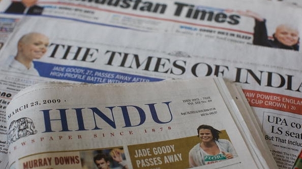 Popular Indian newspapers. (Daniel Berehulak/Getty Images)