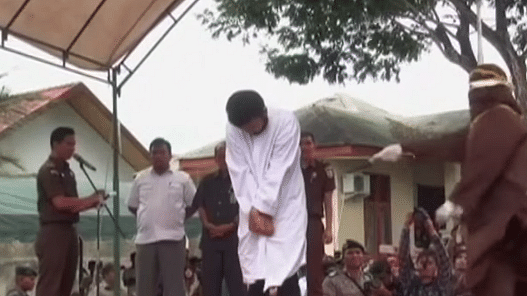 Gay man getting caned publicly in Aceh, Indonesia (Euronews)