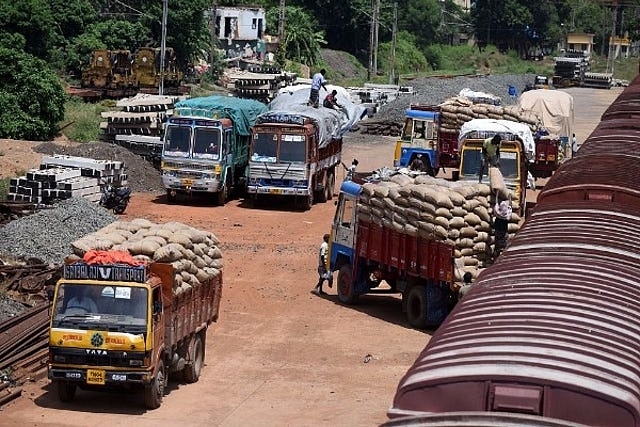 Trucks carrying goods.