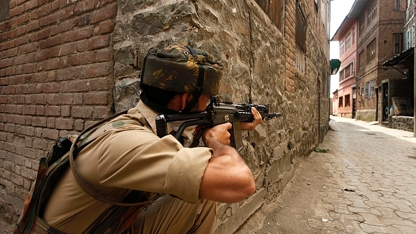  A policeman takes position in Srinagar, Jammu and Kashmir. (Waseem Andrabi /Hindustan Times via Getty Images)