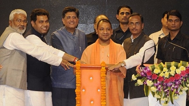 Union power minister Piyush Goyal inaugurating the ‘power for all’ programme in the presence of Uttar Pradesh chief minister Yogi Adityanath, deputy chief minister Dinesh Sharma and UP energy minister Srikant Sharma on 14 April 2017 in Lucknow, India. (Ashok Dutta/Hindustan Times via Getty Images)