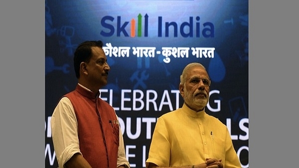 Prime Minister Narendra Modi (R) with Minister of State Skill Development &amp; Entrepreneurship (Independent Charge) Rajiv Pratap Rudy during the launch of the ‘Skill India’ initiative in New Delhi on 15 July 2015. (PRAKASH SINGH/AFP/Getty Images)