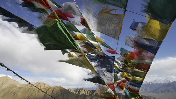 Tibetan prayer flags fly over the city of Leh at 12,000ft above sea level  in Ladakh, India. (Paula Bronstein/Getty Images)