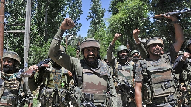 Indian armed forces celebrate after a successful operation against terrorists. (Waseem Andrabi/ Hindustan Times via GettyImages)