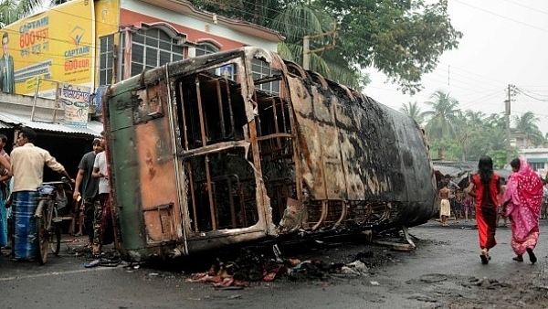 Vehicles torched in violence in Baduria after protests over an objectionable social media post in North 24 Parganas. (Samir Jana/Hindustan Times via Getty Images)