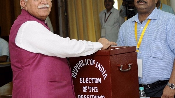 Haryana Chief Minister Manohar Lal Khattar casting his vote for the presidential election. (Keshav Singh/Hindustan Times via Getty Images)