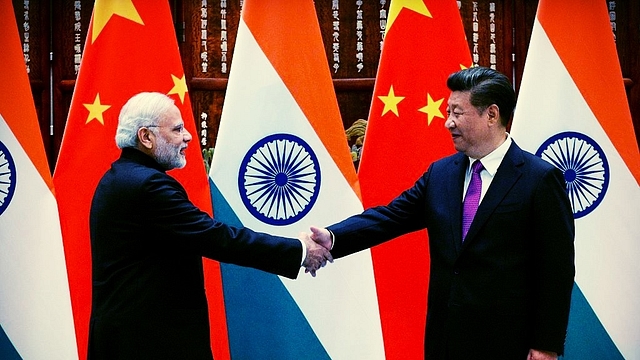  Prime Minister Narendra Modi (L) shakes hands with Chinese President Xi Jinping (R) at the West Lake State Guest House in Hangzhou on September 4, 2016. (WANG ZHAO/AFP/Getty Images)