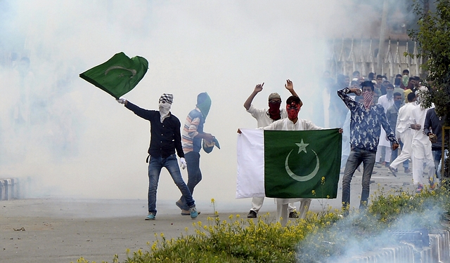 Protestors in Kashmir (Photo Courtesy: Tauseef Mustafa/AFP/Getty Images)