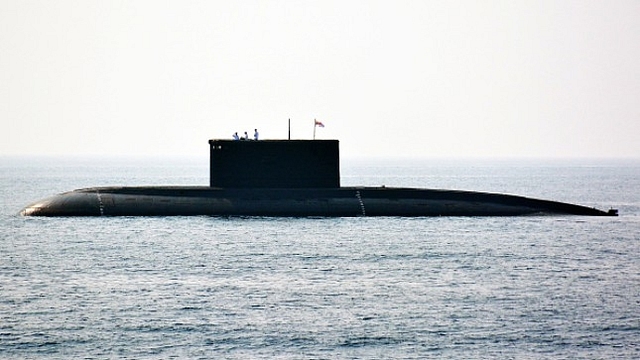 Indian Navy personnel stand on an Indian Navy submarine during the International Fleet Review in Visakhapatnam in 2016. (STR/AFP/Getty Images)