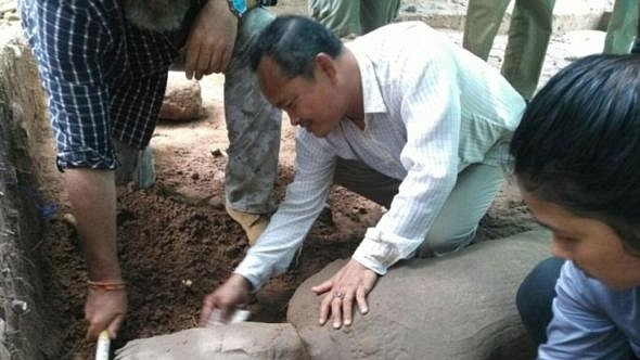 A statue thought to be from the late 12th to the early 13th century has been found at Cambodia’s famed Angkor temple complex. (AFP)