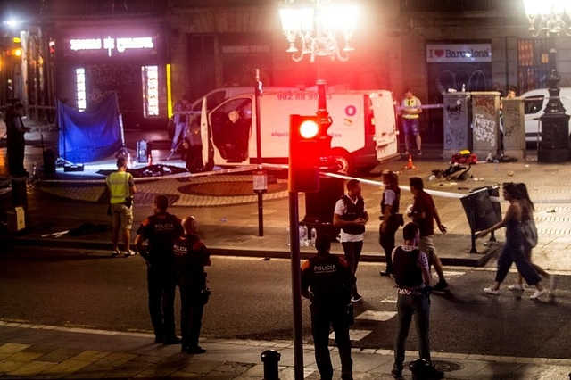 
Catalan police at the site of the attack. 