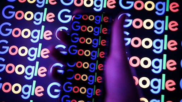  The Google logo is displayed on a mobile phone and computer
monitor. (Leon Neal/GettyImages)