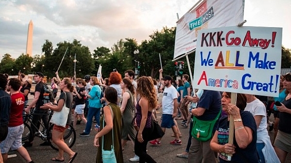 Demonstrators march on 13 August 2017 in Washington, DC, to a statue of Confederate General Albert Pike. (ZACH GIBSON/AFP/Getty Images)