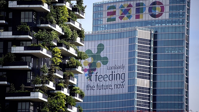 A picture shows the Lombardia Region building advertizing EXPO2015 (R) and a part of the Bosco Verticale towers (Vertical Forest) in the Porta Nuova area on April 28, 2015. (OLIVIER MORIN/AFP/Getty Images)