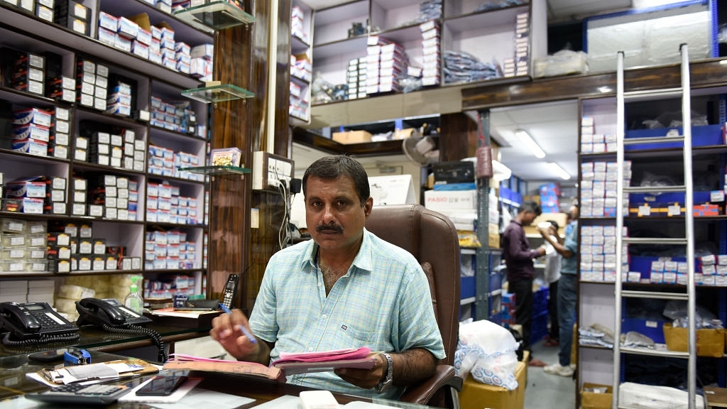 Vinay Narang of Narang Motors filing GST returns. The tax regime
has affected the auto parts dealers in New Delhi. (Saumya Khandelwal/Hindustan
Times via GettyImages) &nbsp; &nbsp; &nbsp;