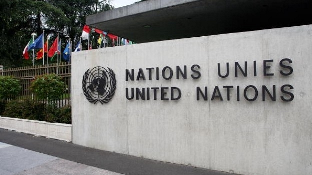 The United Nations emblem is seen in front of the United Nations Office in Geneva, Switzerland. (Johannes Simon/Getty Images)