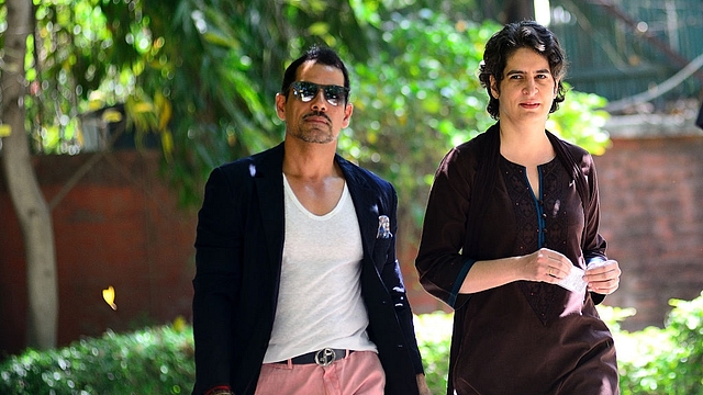 Robert Vadra with his wife Priyanka Gandhi going to cast the vote for general election of the 16th Lok Sabha 2014 on April 10, 2014 in New Delhi, India. (Priyanka Parashar/Mint via Getty Images)