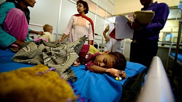 Children suffering from malnutrition getting treated at Guru Gobind Singh Hospital in 2014 in New Delhi. (Priyanka Parashar/Mint via Getty Images)