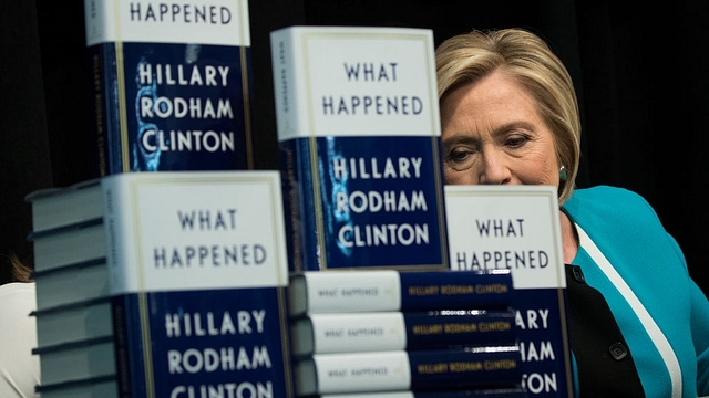 Former U.S. Secretary of State Hillary Clinton signs copies of her new book ‘What Happened’ during a book signing event at Barnes and Noble bookstore September 12, 2017 in New York City. Clinton’s book, which focuses on her 2016 election loss to President Donald Trump, goes on sale today. (Drew Angerer/Getty Images)