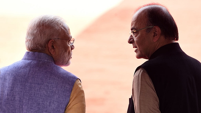 Prime Minister Narendra Modi, talking with Union Finance Minister Arun Jaitley (Sonu Mehta/Hindustan Times via Getty Images)