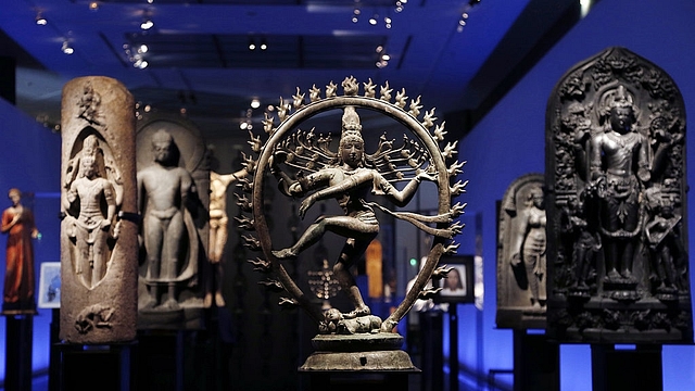 An 11th century bronze Nataraja Siva from India is displayed
a a Paris exhibition. (FRANCOIS GUILLOT/AFP/Getty Images)