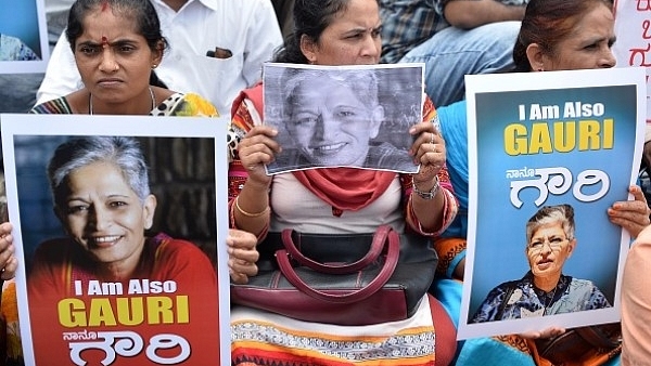 Indian protesters take part in a rally condemning the killing of journalist Gauri Lankesh in Bengaluru on 6 September  2017. (MANJUNATH KIRAN/AFP/Getty Images)