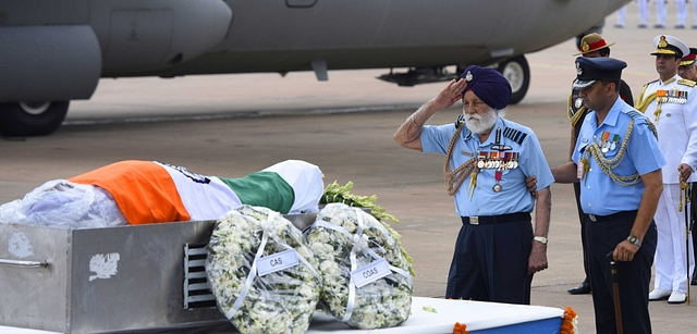 

Air Chief Marshall Sardar Arjan Singh salutes as he pays his last tribute to the body of the former President of India, A. P. J. Abdul Kalam (Vipin Kumar/Hindustan Times via Getty Images)