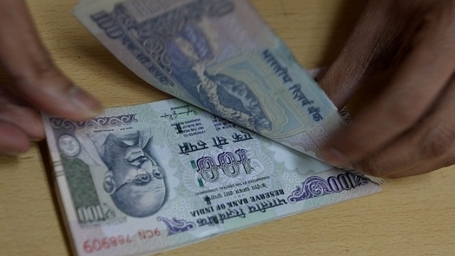  Indian 100-rupee notes (INDRANIL MUKHERJEE/AFP/Getty Images)