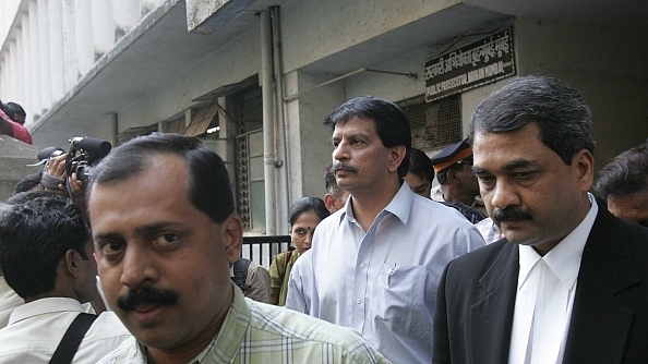 Police encounter specialists Sachin Vaze (left) and Pradeep Sharma. (Vikas Khot/Hindustan Times via Getty Images)