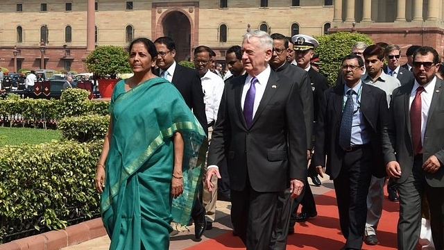 Mattis walks with Defence Minister Nirmala Sitharaman at Defence Ministry prior to a meeting in New Delhi. (PRAKASH SINGH/AFP/GettyImages)