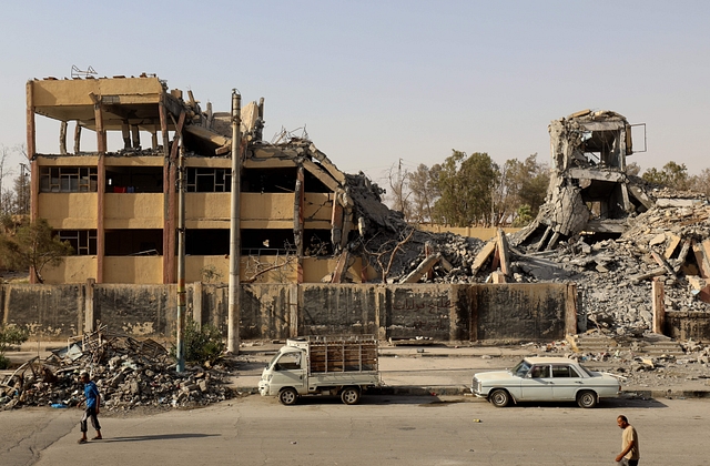 A destroyed building in Raqa, Syria (DELIL SOULEIMAN/AFP/Getty Images)