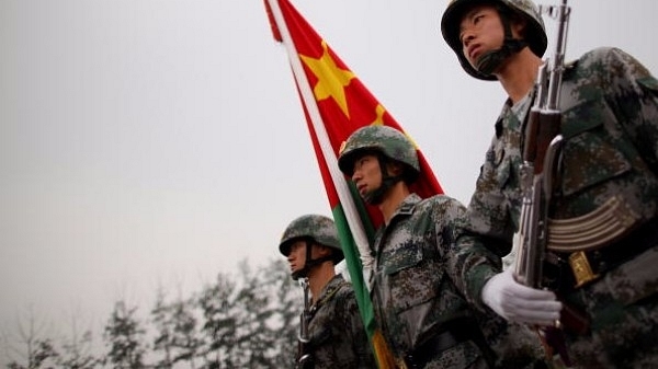 People’s Liberation Army soldiers show off their skills in Beijing, China (Feng Li/Getty Images)