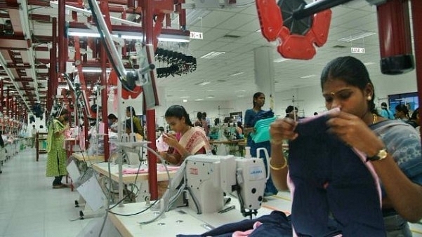 Workers at a garments factory. (Getty Images)