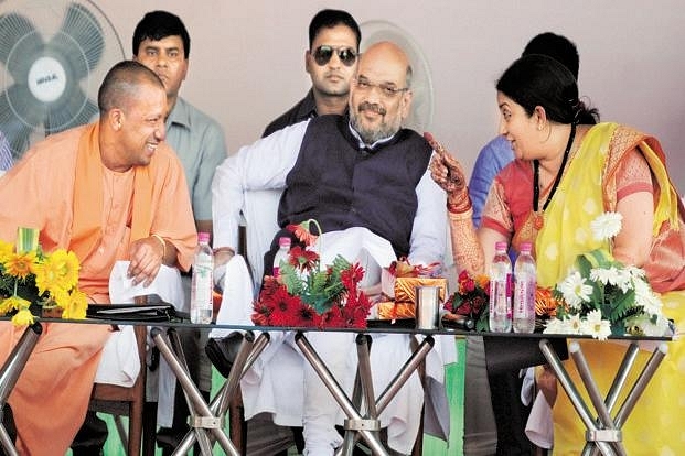 Amit Shah, Adityanath and Union Minister Smriti Irani in Amethi on Monday. (Mint)