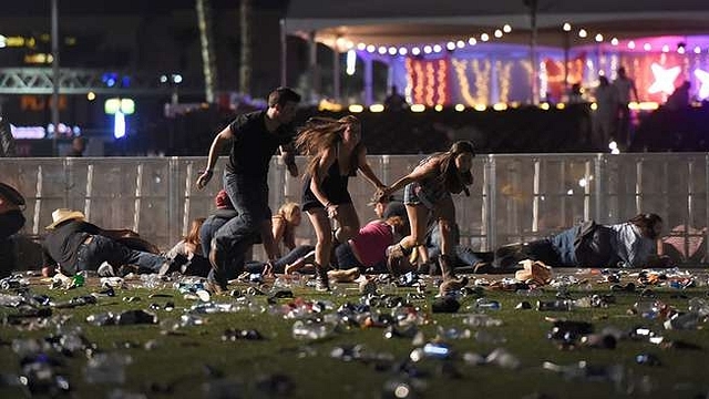 

People fleeing the attack. (David Becker/AFP via GettyImages)