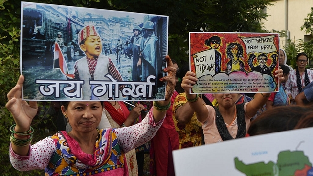 Supporters of Gorkhaland Movement chant slogans during the 38th day of an indefinite strike at Milanmore village in Darjeeling district on the outskirts of Siligur (DIPTENDU DUTTA/AFP/Getty Images)