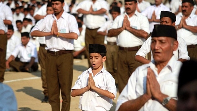 RSS volunteers performing yoga (Nitin Kanotra/Hindustan Times via Getty Images)