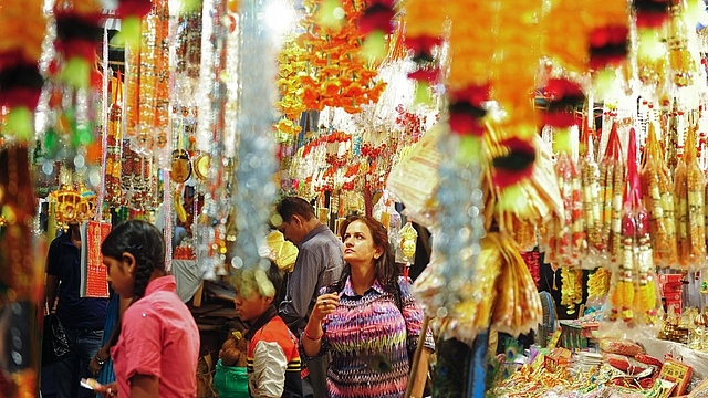 Indian shoppers browse decorative items at roadside stalls ahead of Diwali in Allahabad. (Sanjay Kanojia/AFP/GettyImages)