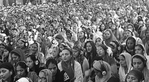 Devotees using headphones (ANI)